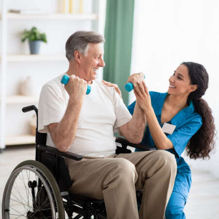 nurse-with-patient-exersicing nurse-with-patient-exersicing